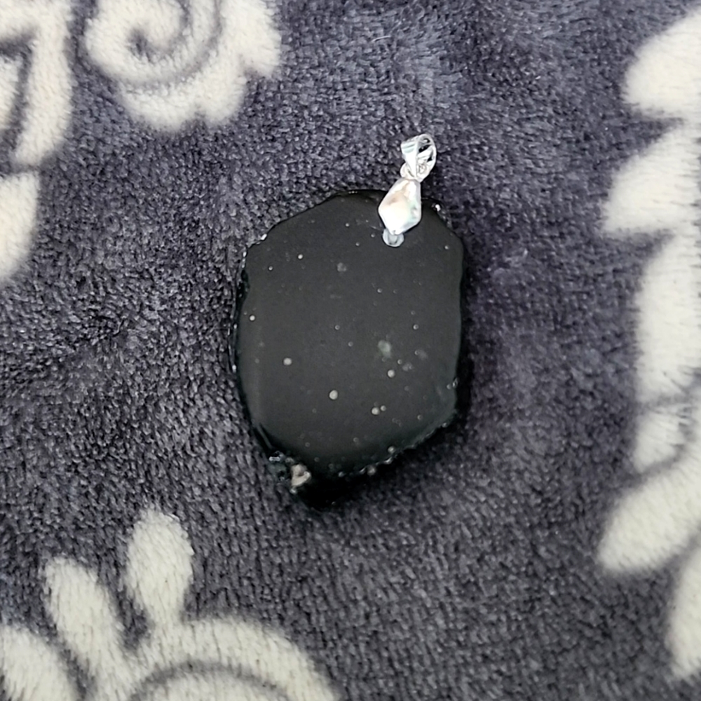 Malachite pendant,  with silver clasp